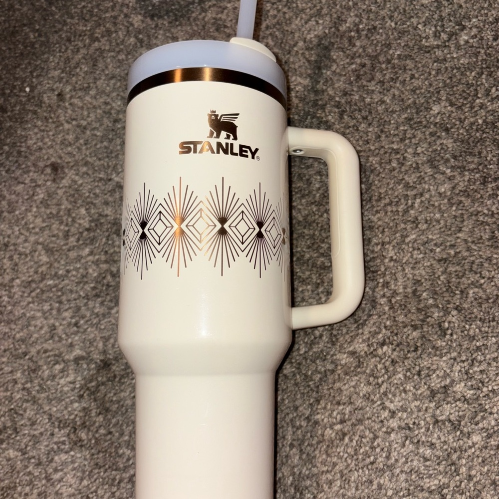 Seasonal Stanley 40oz. Barely used. Minor Scuffing pictured.